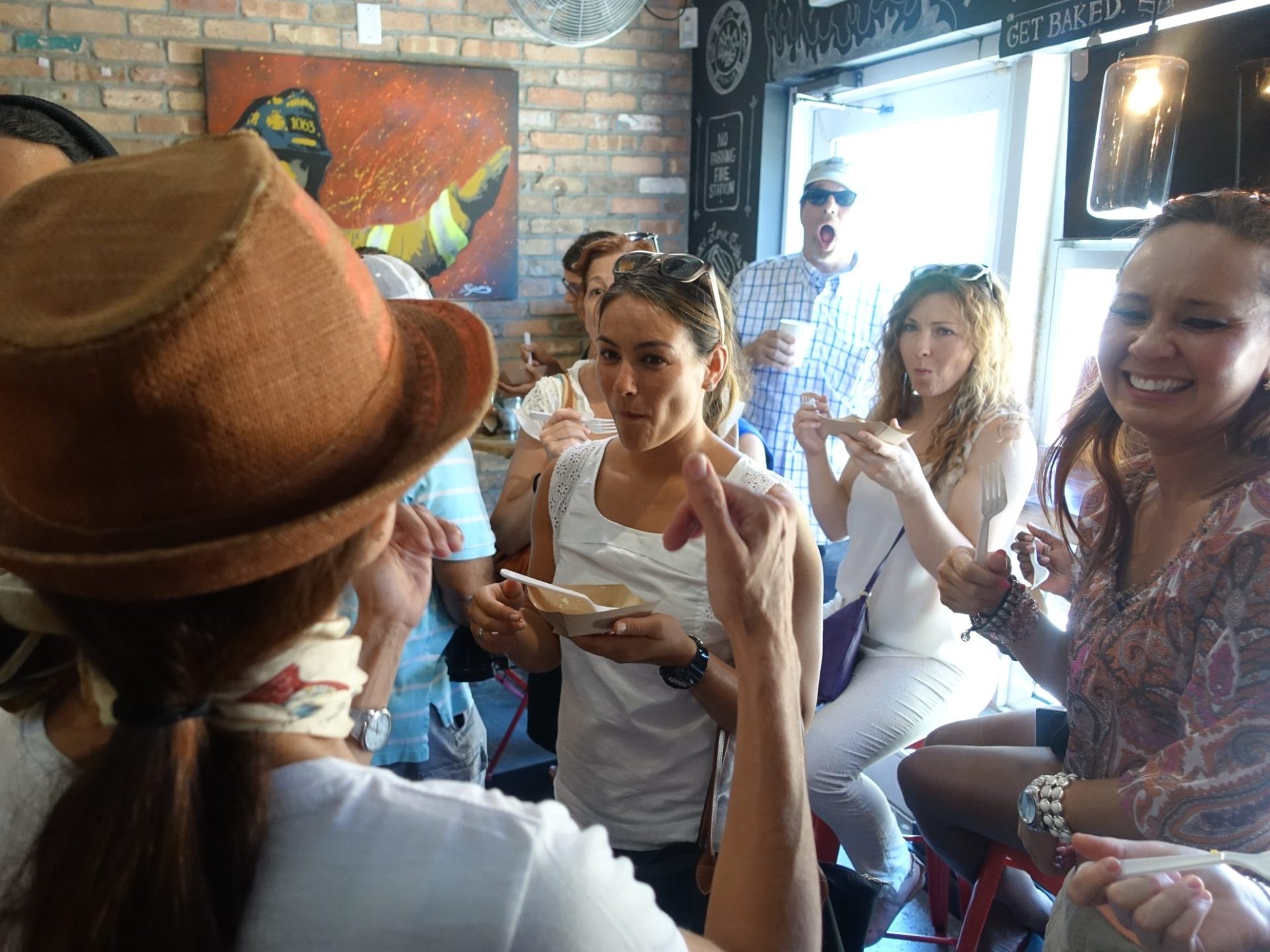 a group of people sitting and looking at the camera
