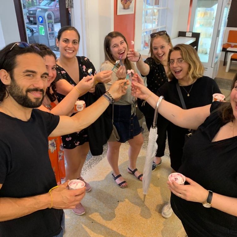 a group of people posing for the camera