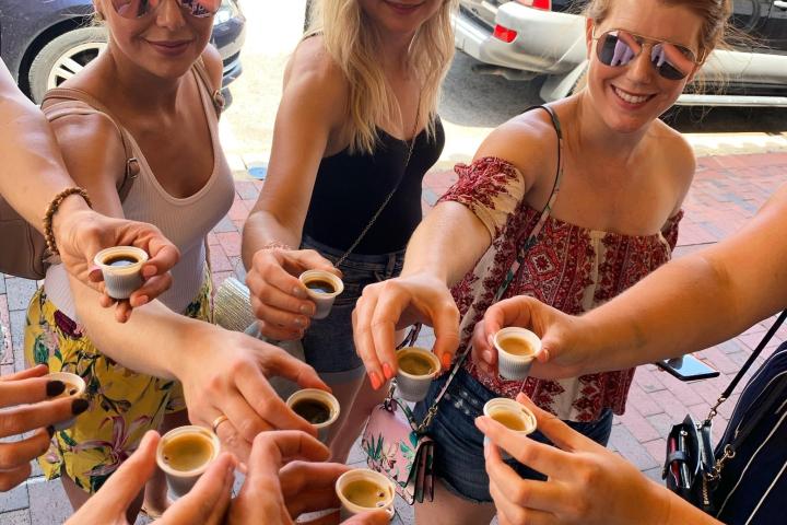 a group of people riding on the back of a woman