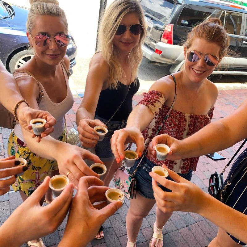 a group of people riding on the back of a woman