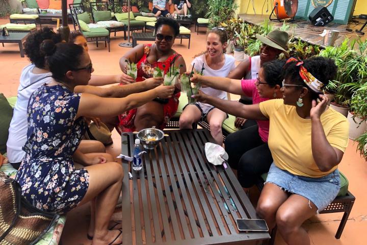 Christine Renaud et al. sitting on a bench