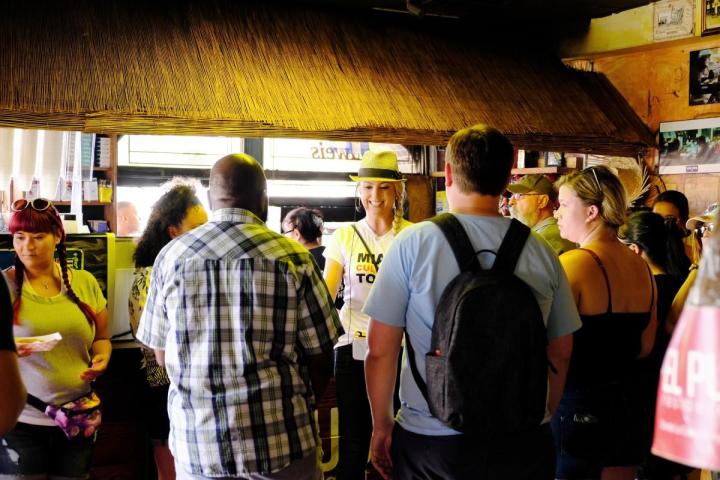 a group of people standing in a room